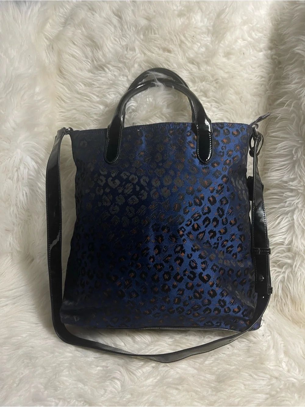 Banana Republic Fabric Navy Blue Leopard Print Tote Bag with Black patent trim.